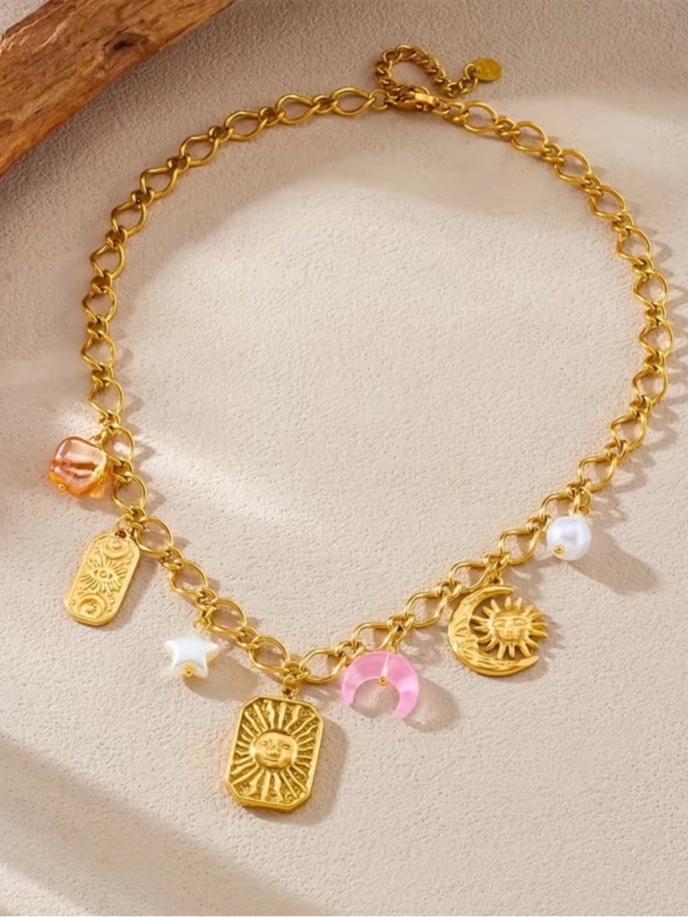 Gold Sun and Moon Charm Necklace with Pink and White Accents